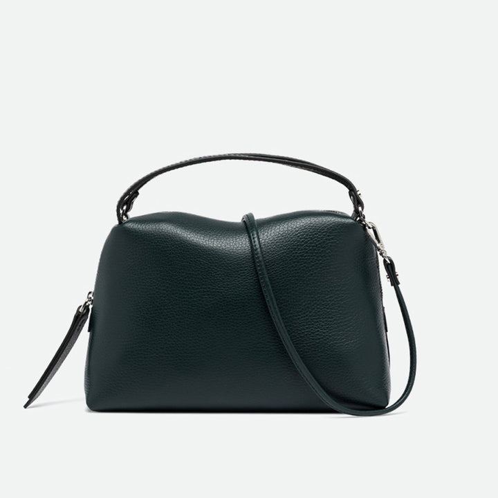 Dark green grained leather handbag with two top handles and a long crossbody strap