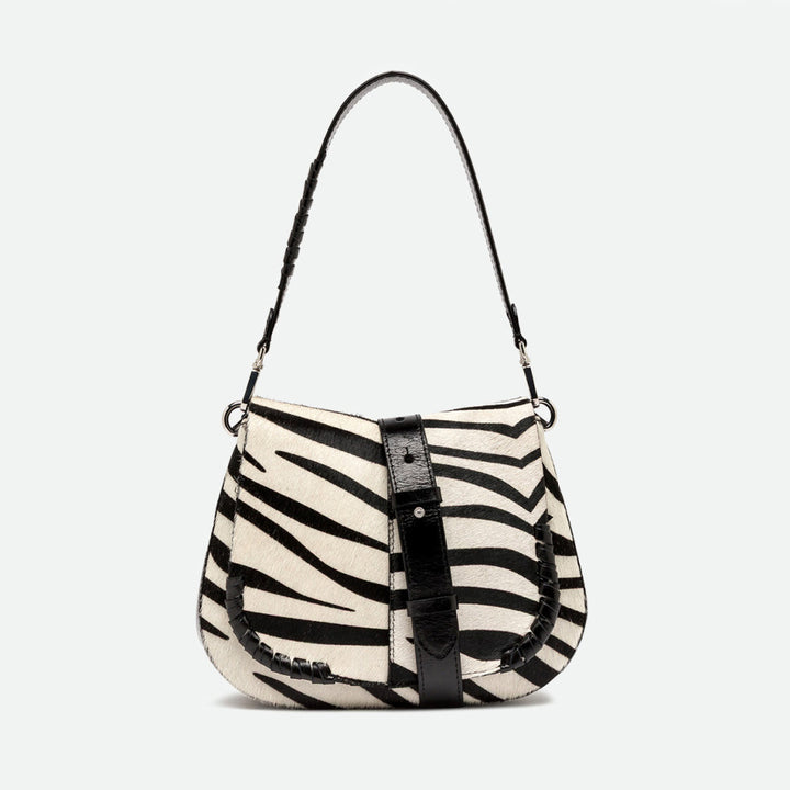 Rounded shoulder bag in black and cream zebra print with a black leather strap