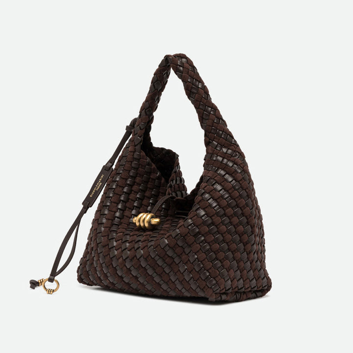 Angled view of a dark brown woven leather hobo bag with drawstring ties