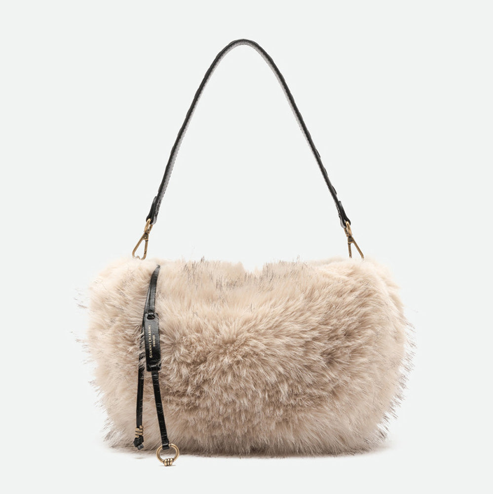 Cream faux fur shoulder bag with a black leather strap and antique gold rings