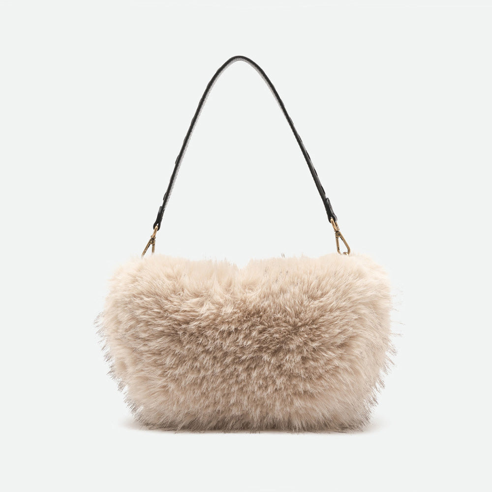 Back of a cream faux fur shoulder bag