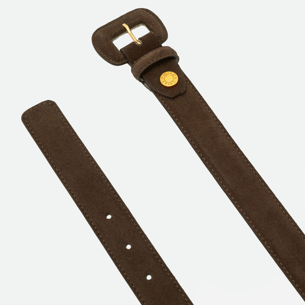 Close-up of a dark brown suede belt showing the suede covered buckle and punched holes