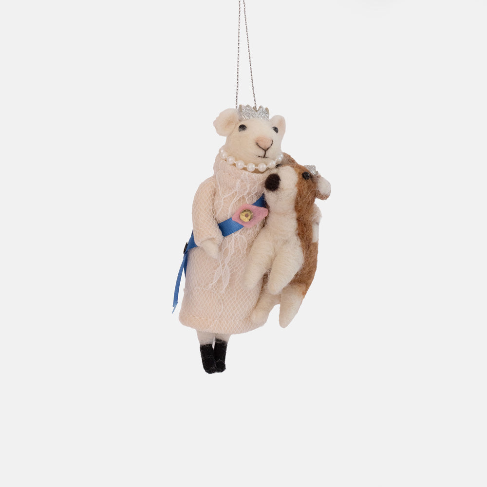 Felt mouse in a cream coat, silver crown and pearl necklace with a blue sash, holding a brown and white felt corgi