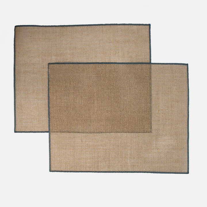set of 2 beige woven placemats with a blue border on a white background