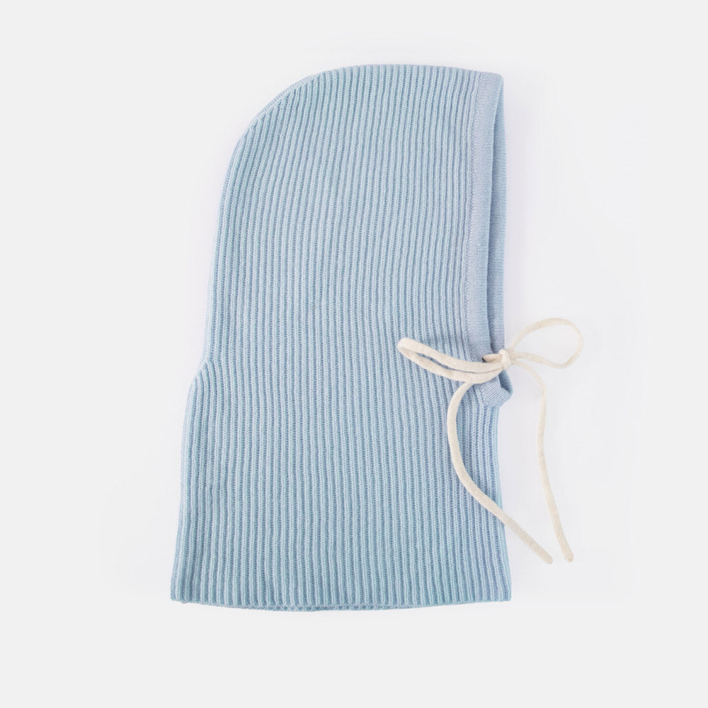 A light blue ribbed knit hood  with cream-colored drawstrings, shown flat on a white background.
