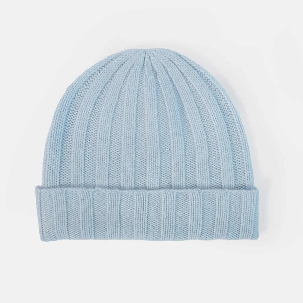 A light blue ribbed knit beanie hat, shown flat against a clean white background.