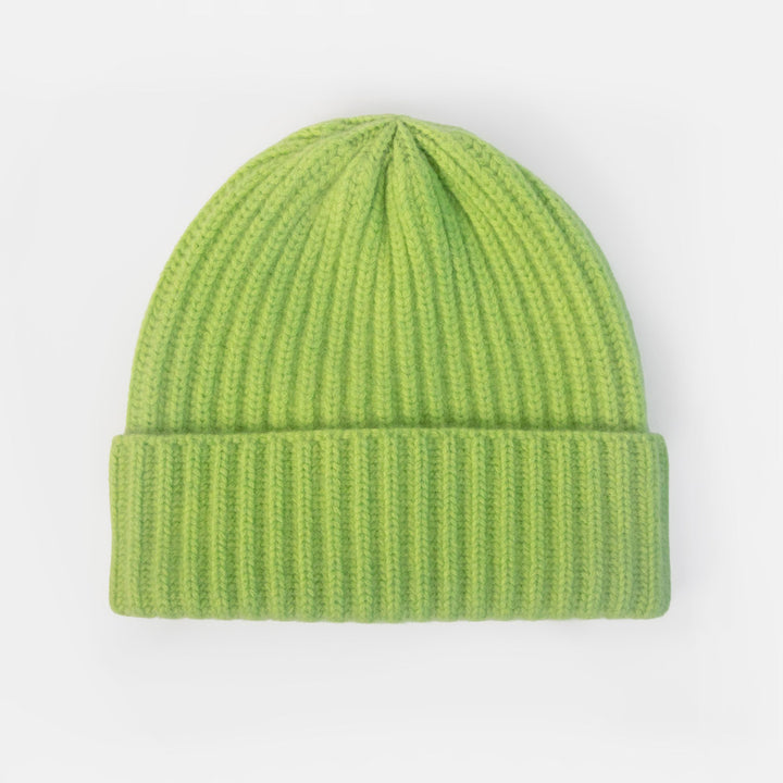 A bright lime green ribbed knit beanie hat, shown flat against a clean white background.