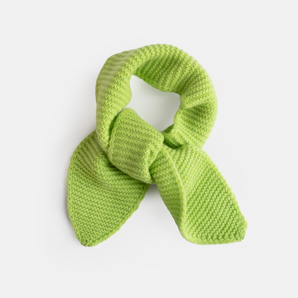 A bright lime green knitted scarf, styled in a loop with two tails, shown on a clean white background.