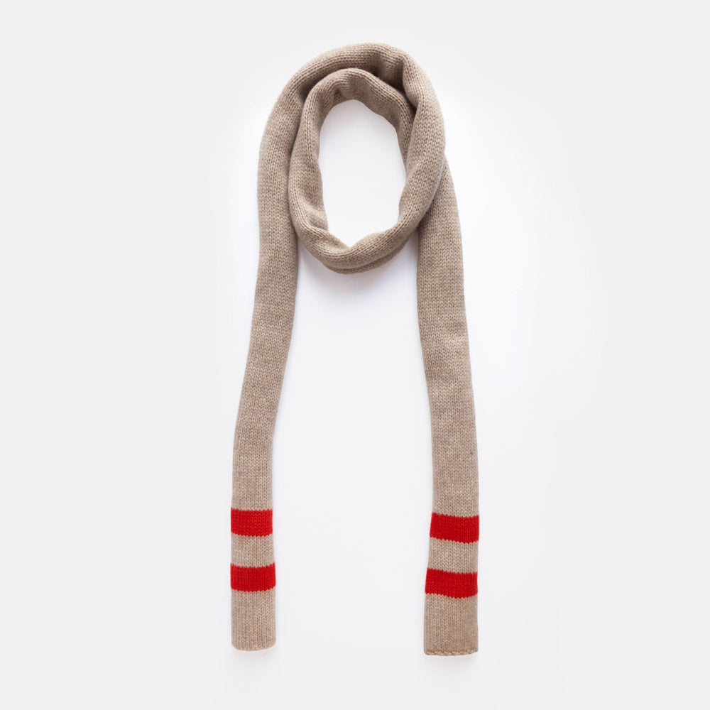 A beige knit scarf with two red stripes near the ends, arranged in a loop on a clean white background.