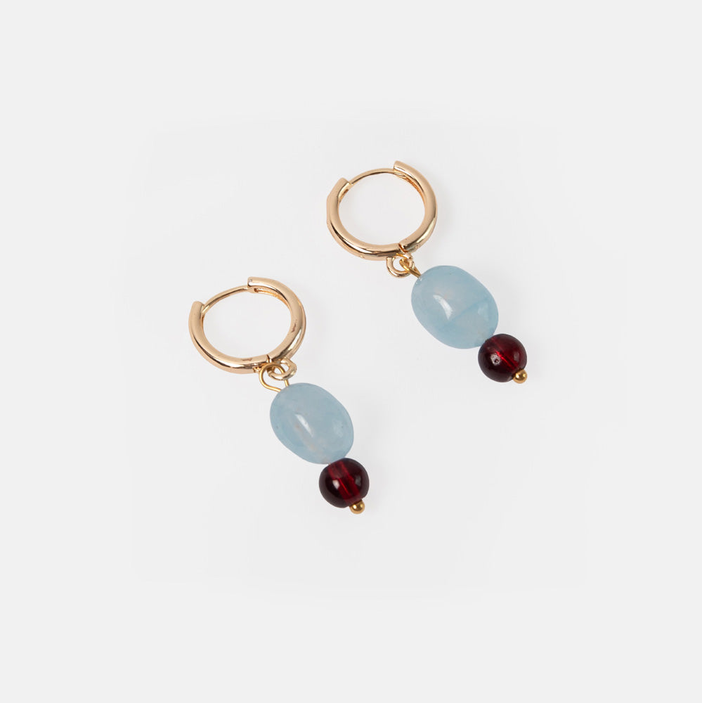 pair of gold hoop earrings with light blue and burgundy beads