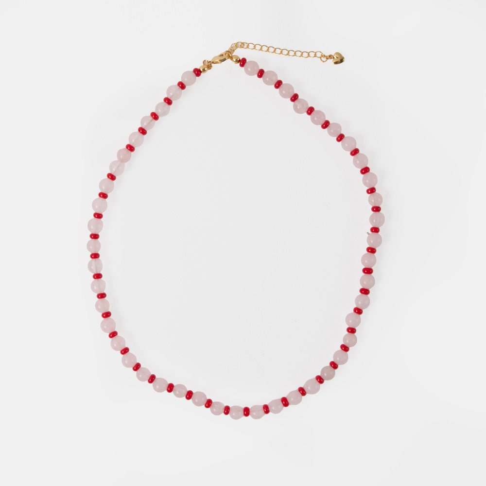 necklace with pink & red beads and gold hardware