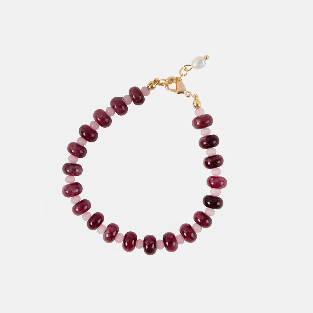 burgundy & pink beaded bracelet on a white background 