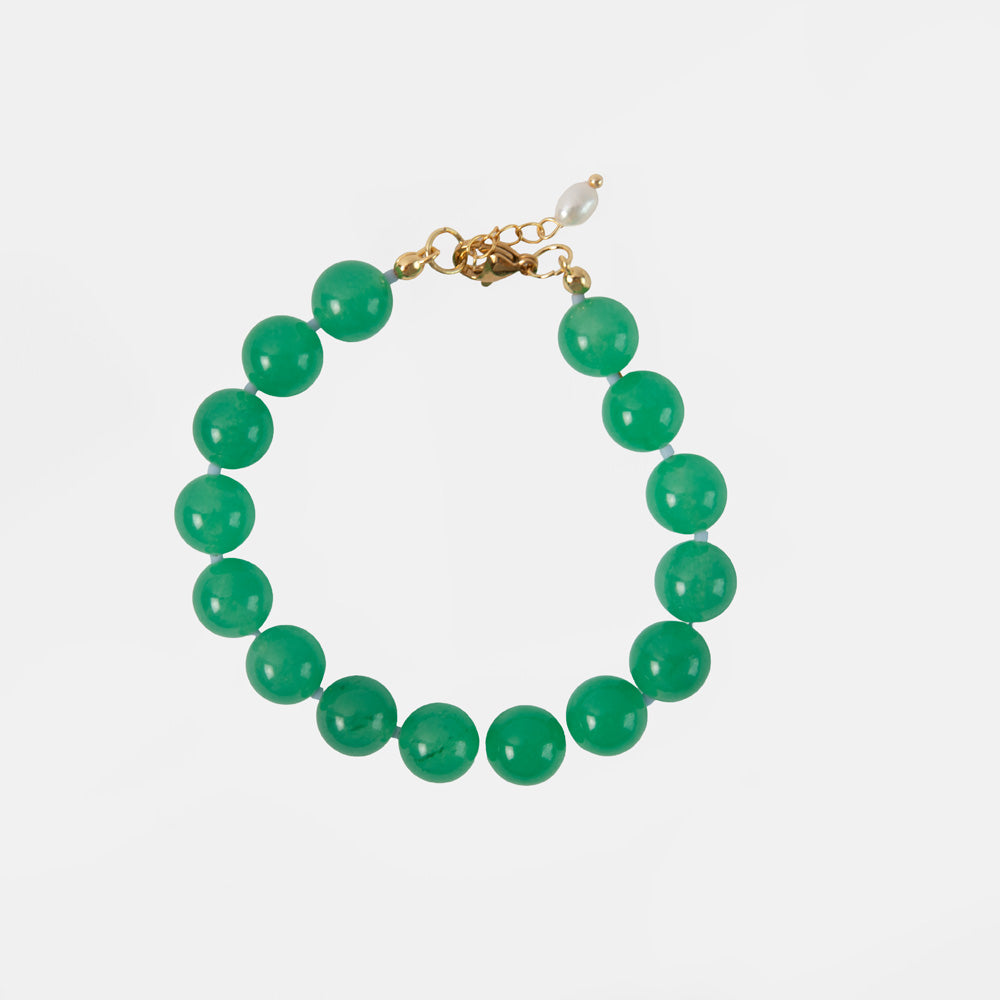 green beaded bracelet on a white background