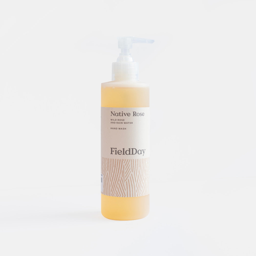fieldday native rose hand wash bottle against a light grey backgrounsd