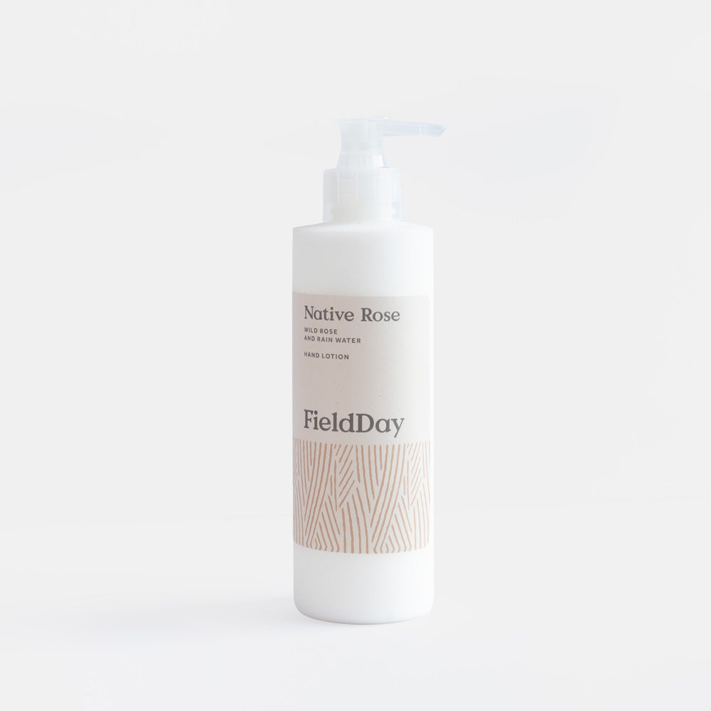 fieldday native rose scented hand lotion bottle against a light grey background