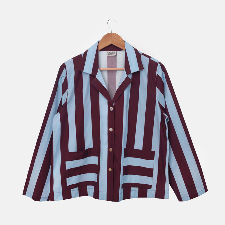 Long-sleeved pyjama shirt in wide blue and wine stripes with a revere collar and sideways-striped patch pockets