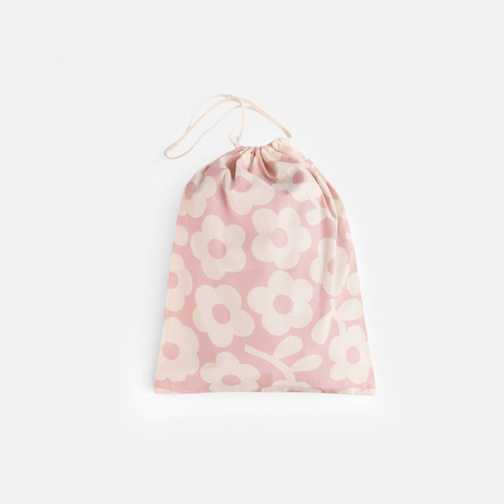 Drawstring cotton bag in pale pink with large cream flowers