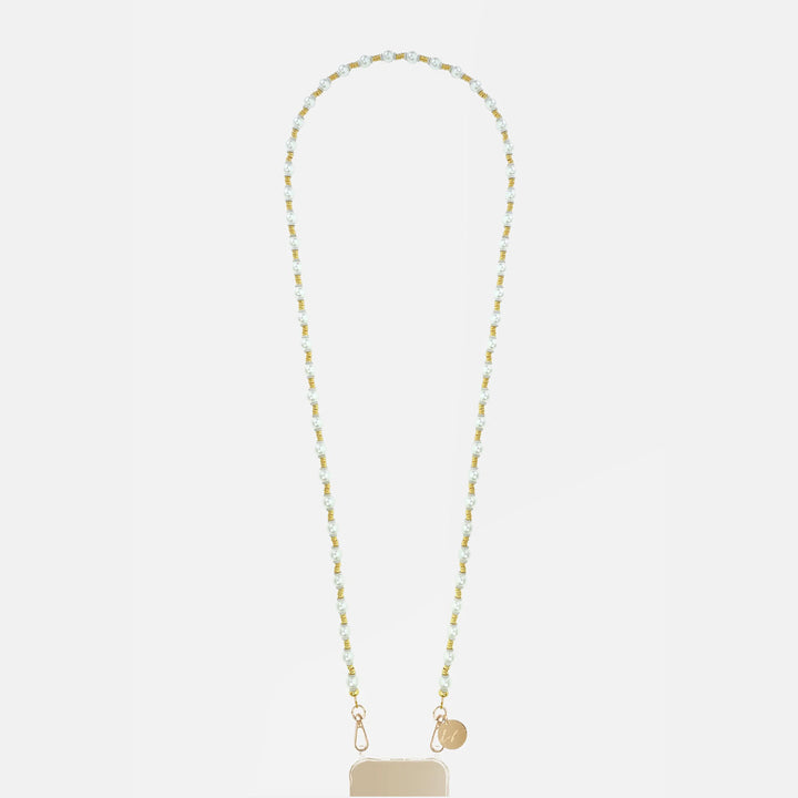 Long pearl and gold beaded phone chain with gold clasps, laid out in a loop