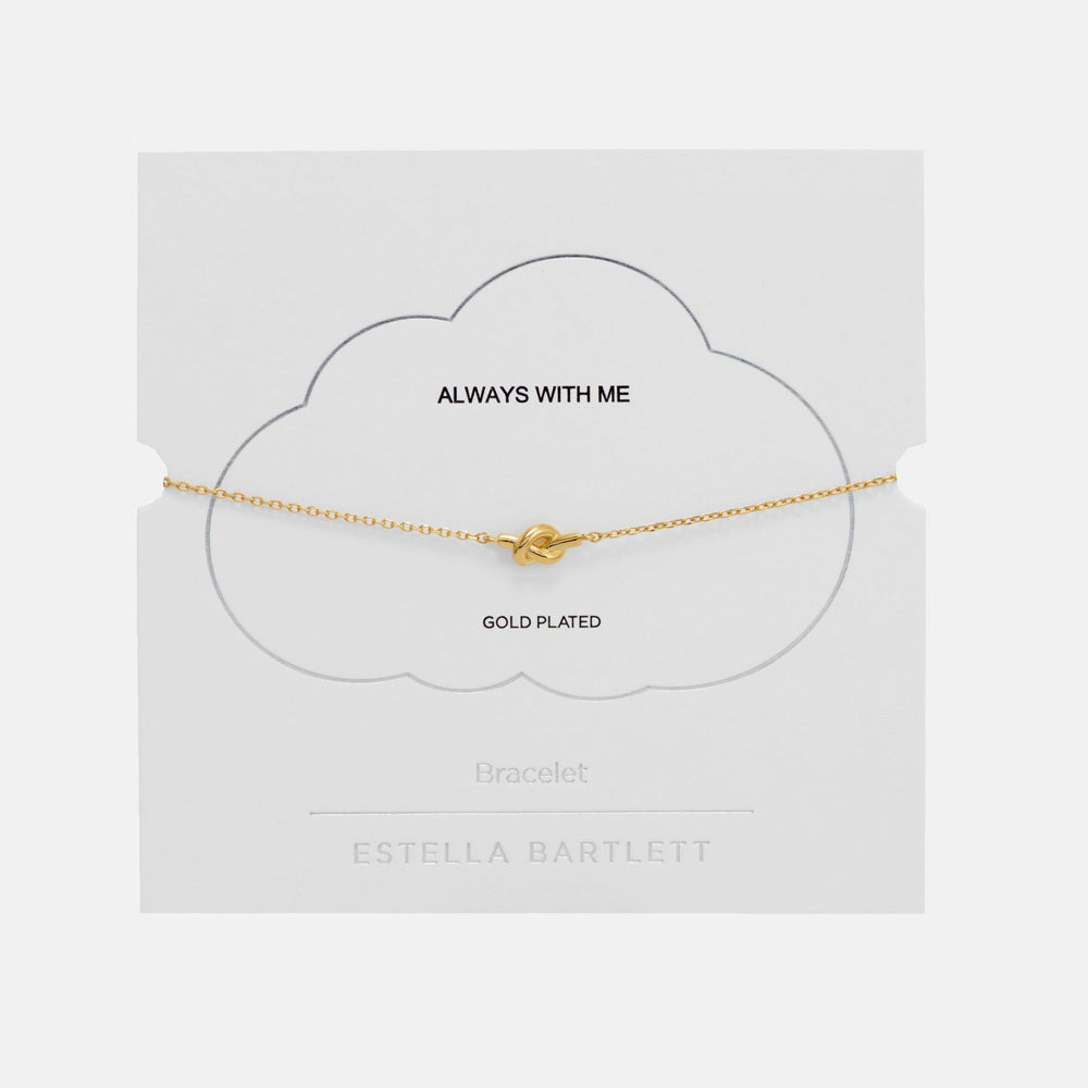 Gold knot bracelet on a white cloud-shaped gift card