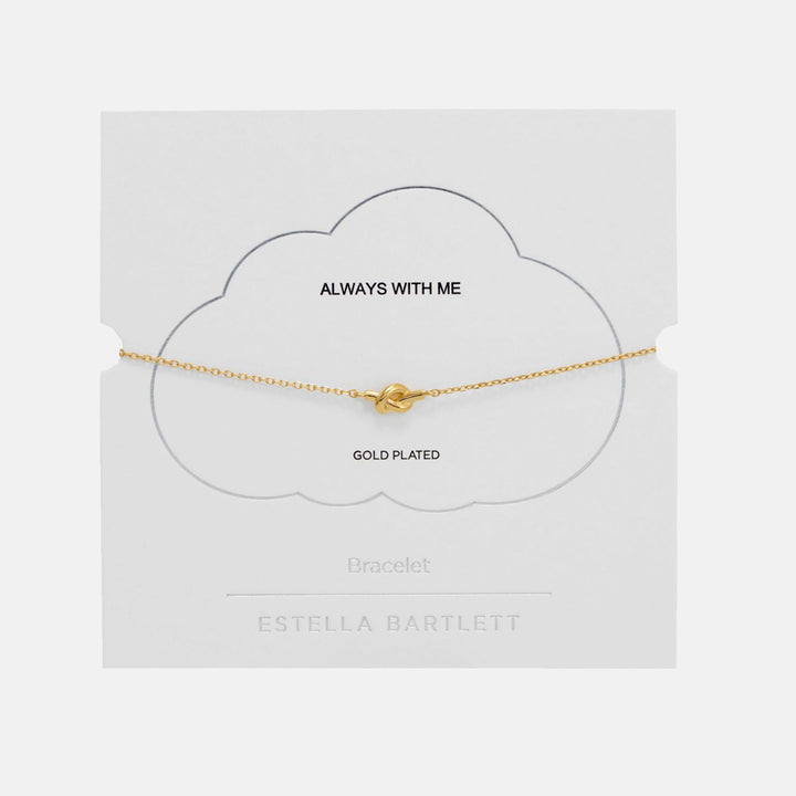 Gold knot bracelet on a white cloud-shaped gift card
