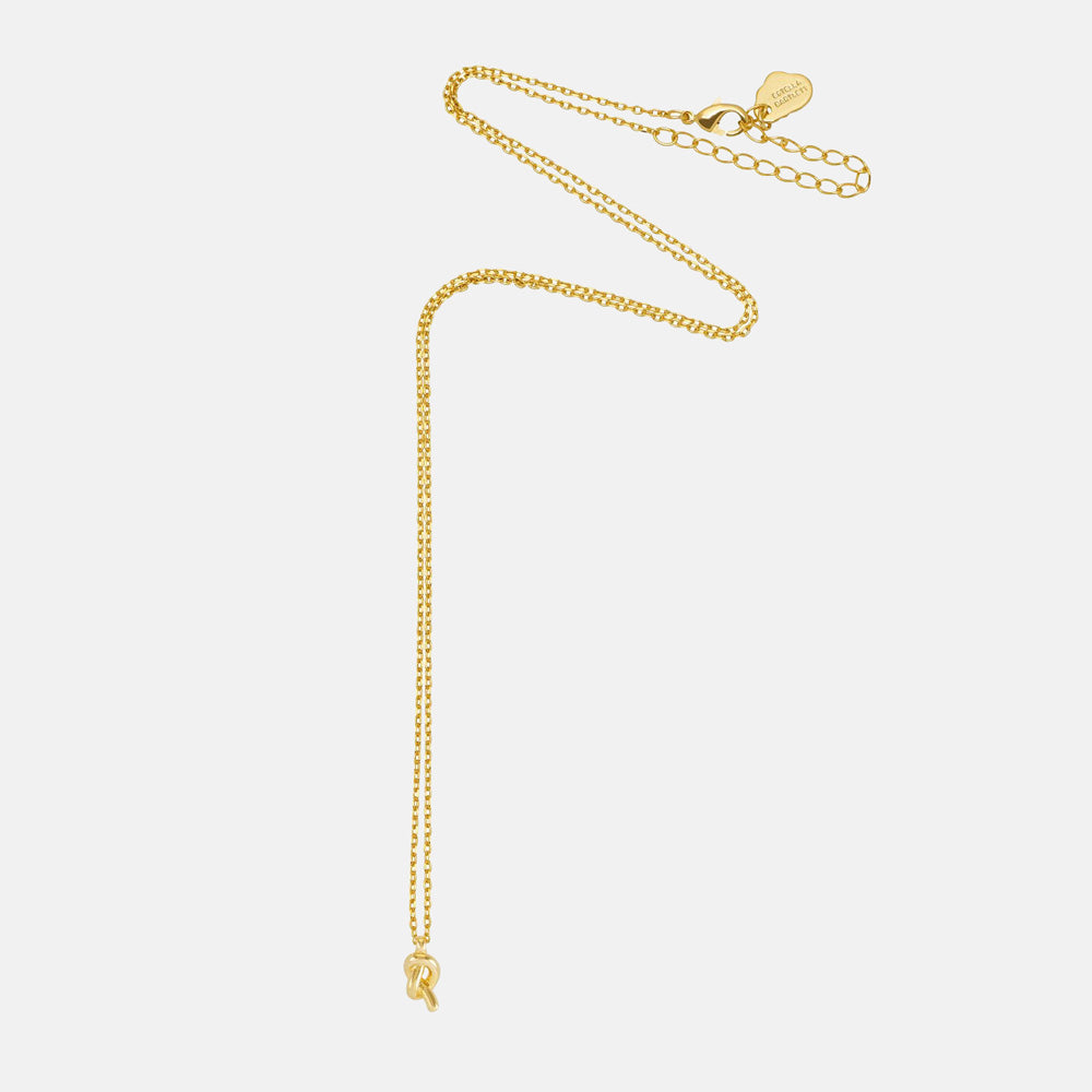 Fine gold chain necklace with a small knot pendant