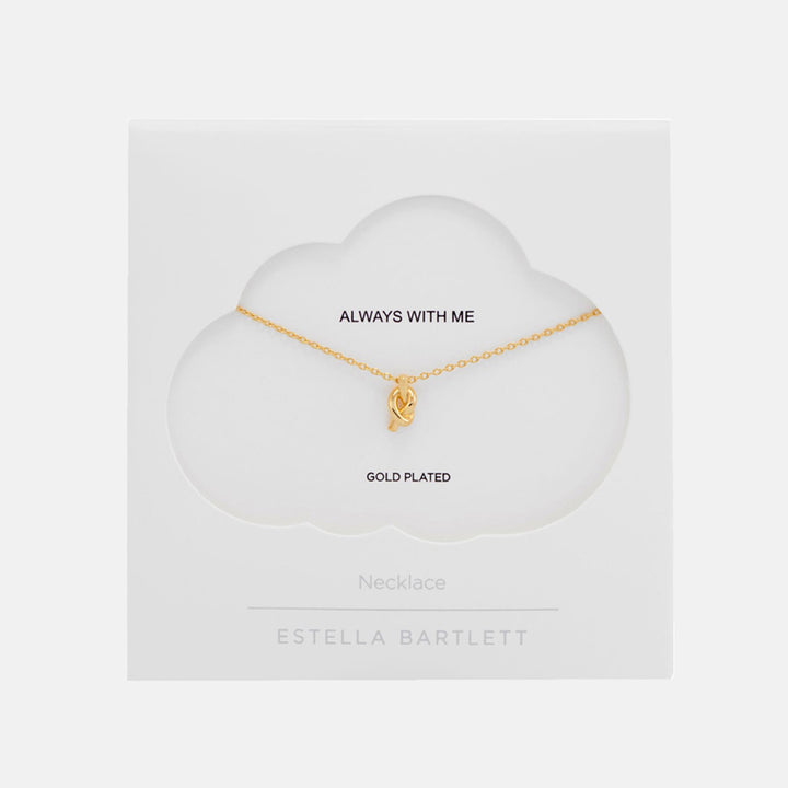 Fine gold chain necklace with a small knot pendant, presented on a white cloud-shaped card reading Always With Me