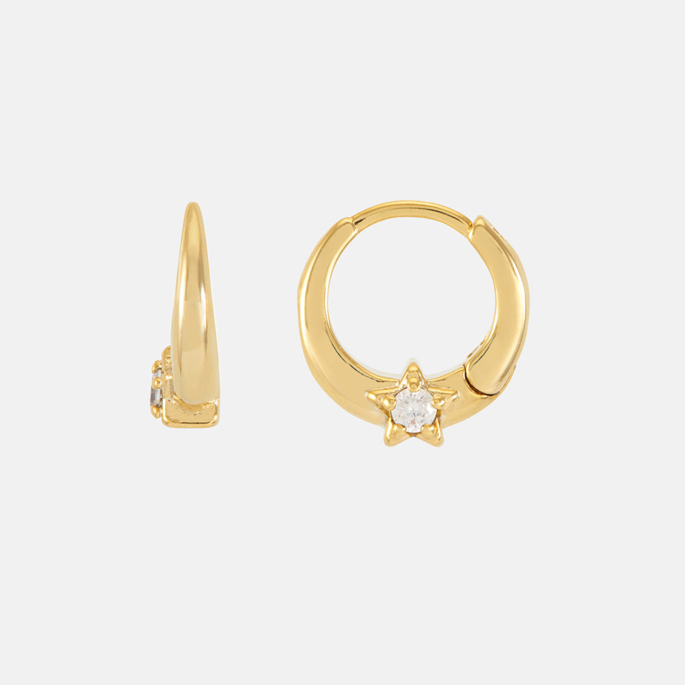 Pair of small gold huggie hoops, each set with a sparkling star