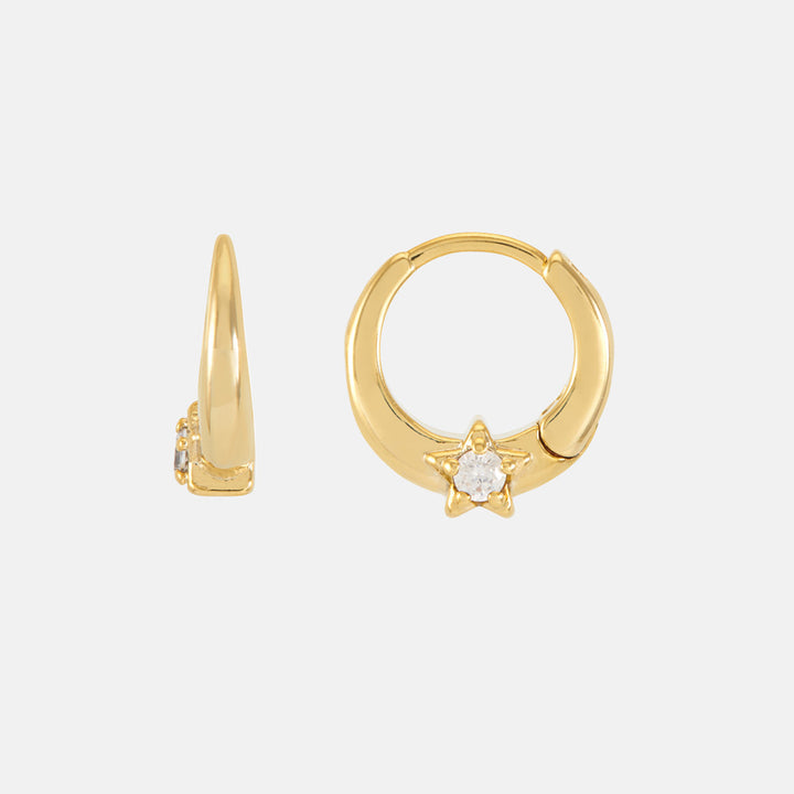 Pair of small gold huggie hoops, each set with a sparkling star