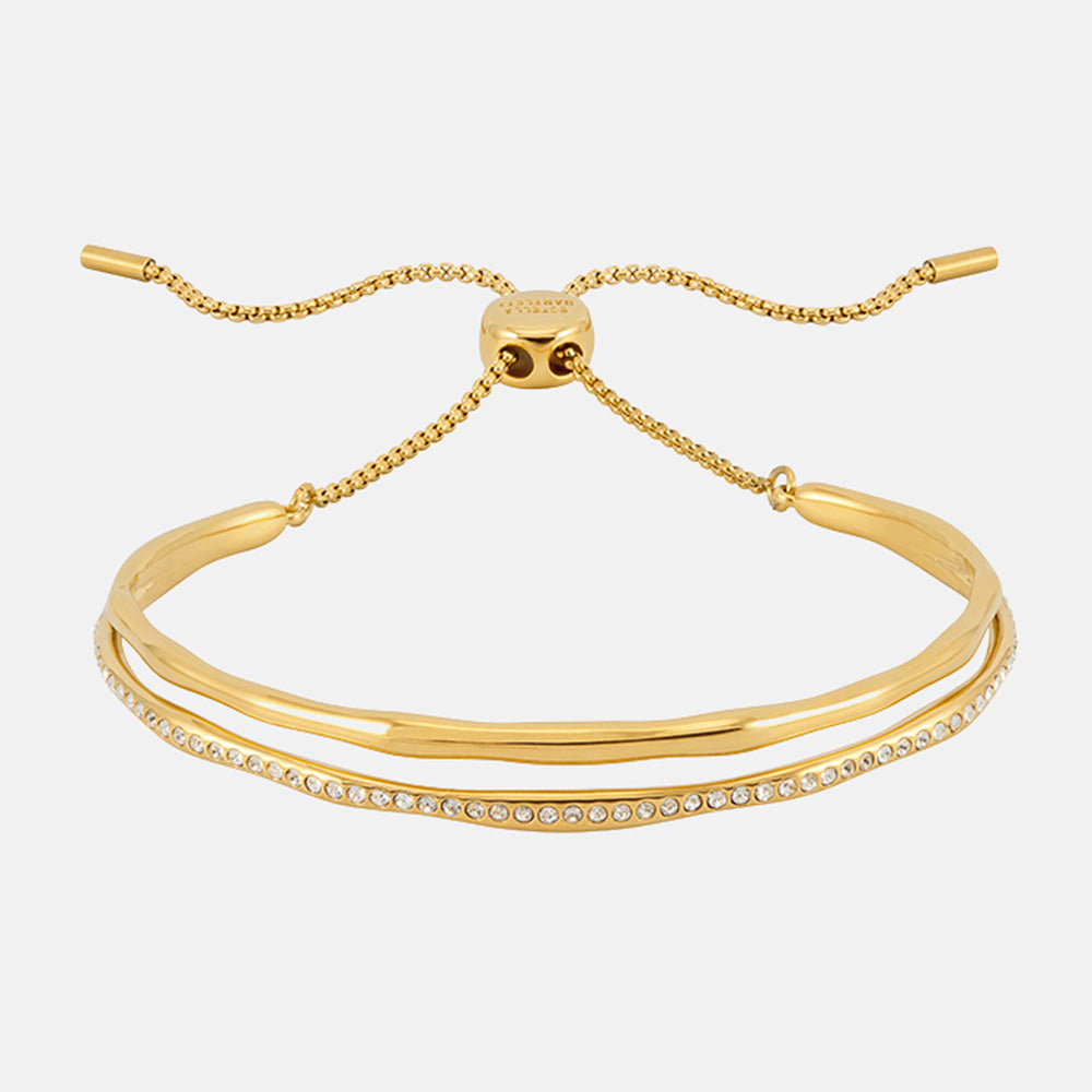 Gold double bangle with one smooth band and one sparkling pave band on a slider chain