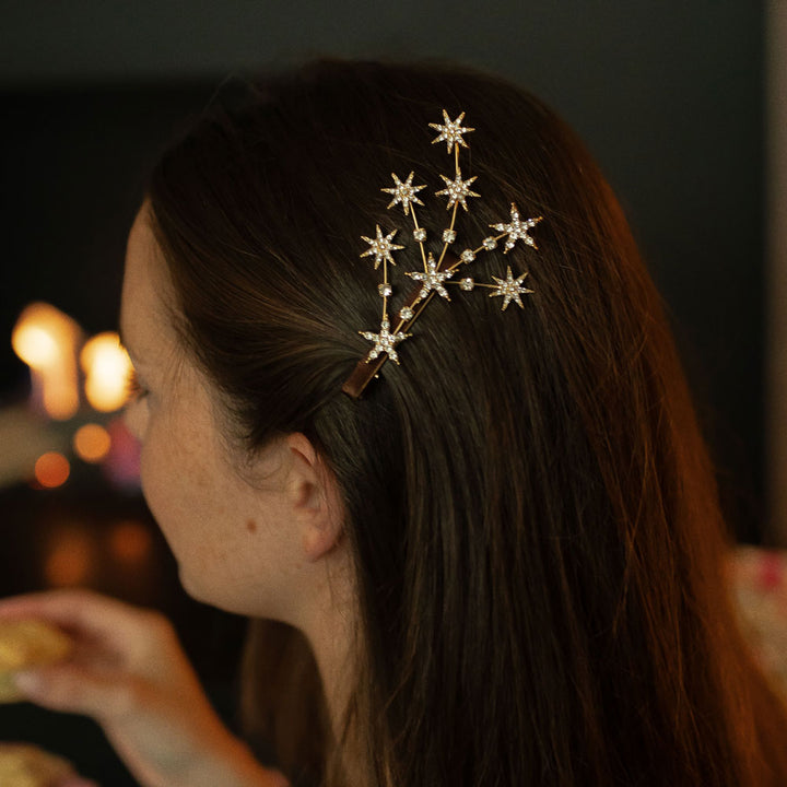 Pince à cheveux étoile filante dorée