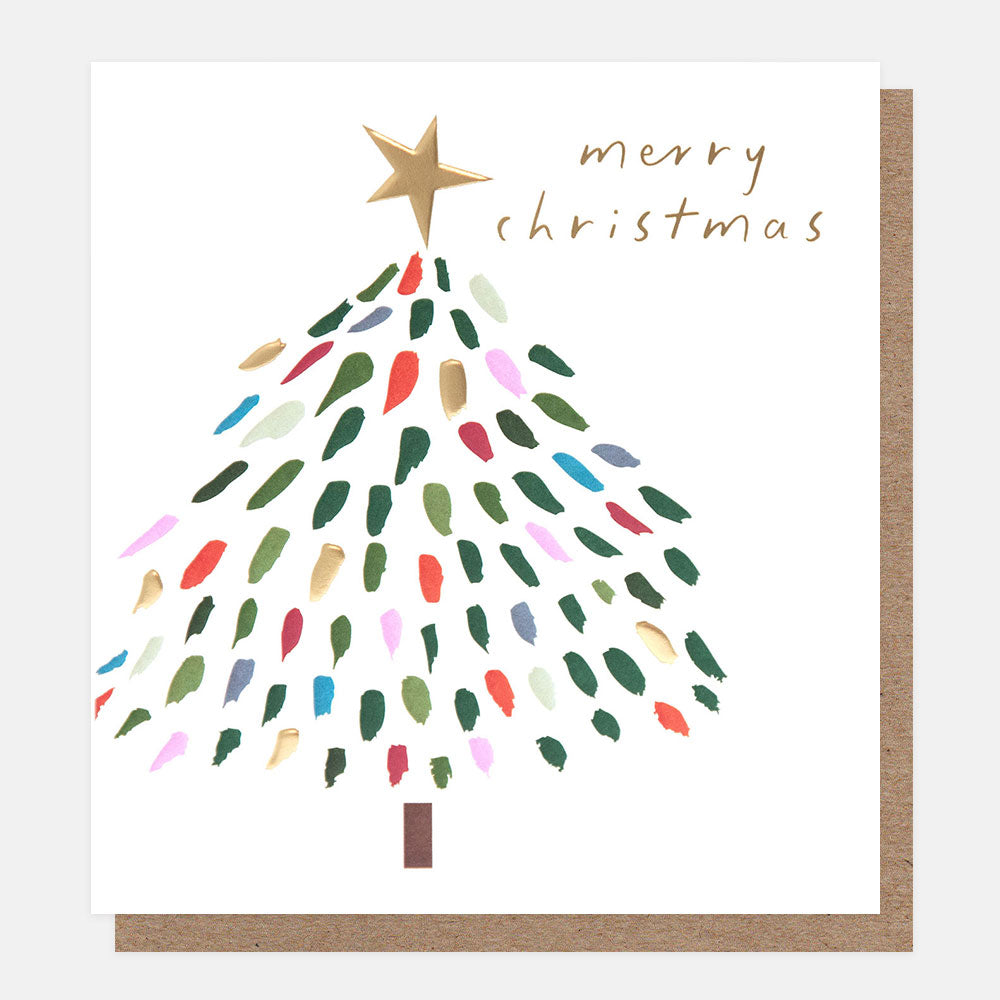 christmas card featuring a design of a tree made from multicoloured paint brushstrokes with a gold star on top and 'merry christmas' text on a white background