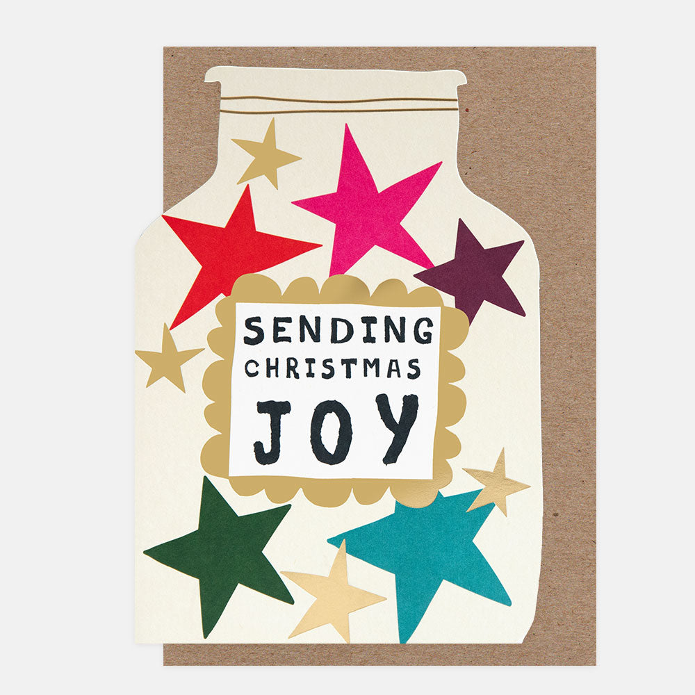 Die cut Christmas card in the shape of a jar with colourful stars and 'Sending Christmas Joy' text on a white background