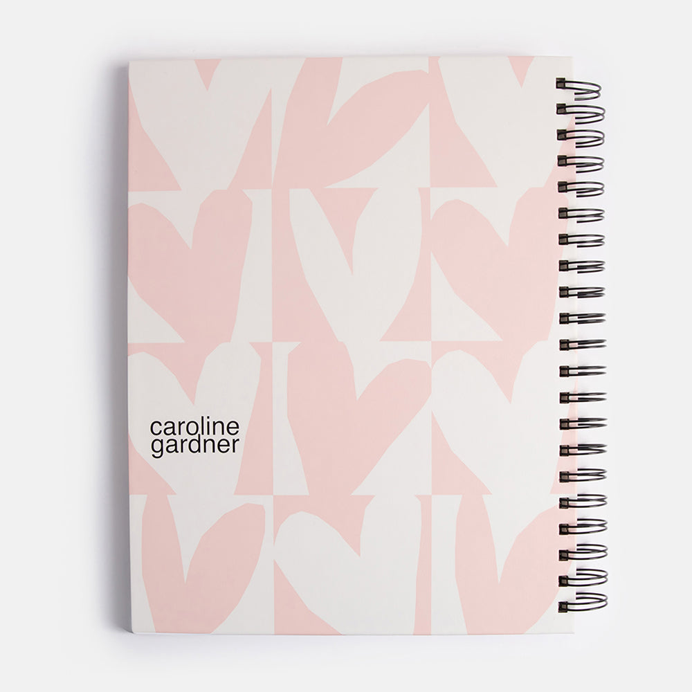 a4 spiral bound hardcover notebook with pink checked hearts print