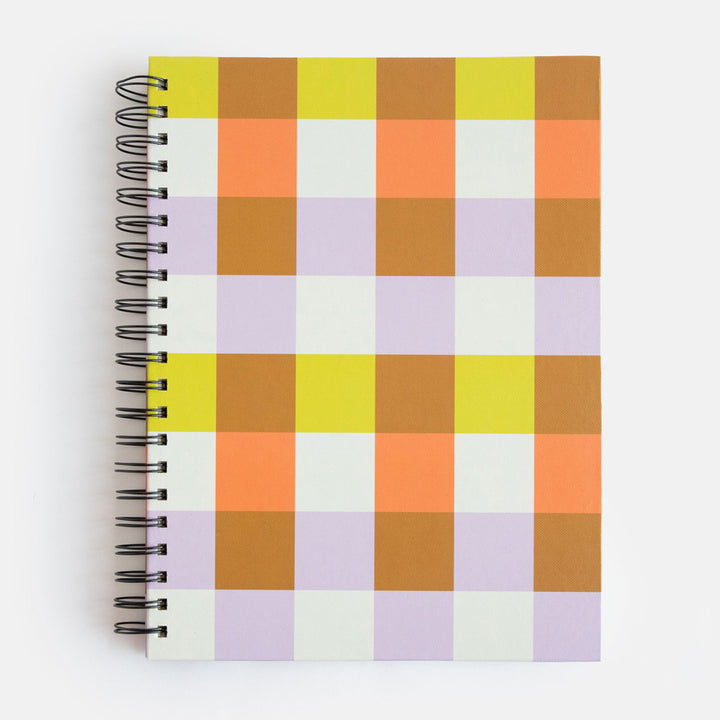 a4 spiral bound hardcover notebook with a warm tones checked print cover