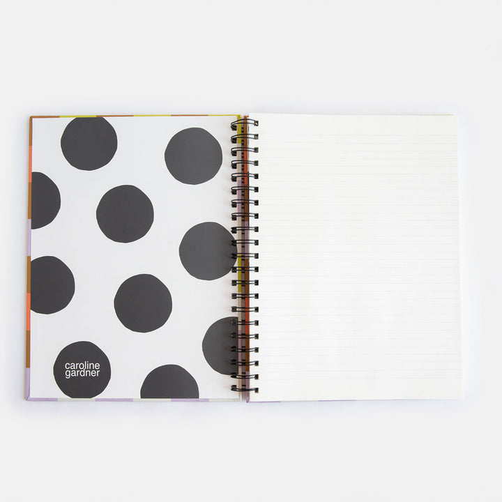 a4 spiral bound hardcover notebook with a big spot lining and lined pages