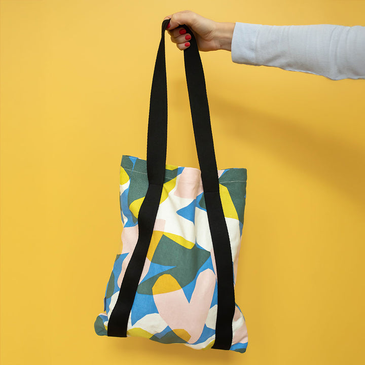 MULTI COLOURED HEARTS PRINT TOTE BAG ON YELLOW BACK GROUND