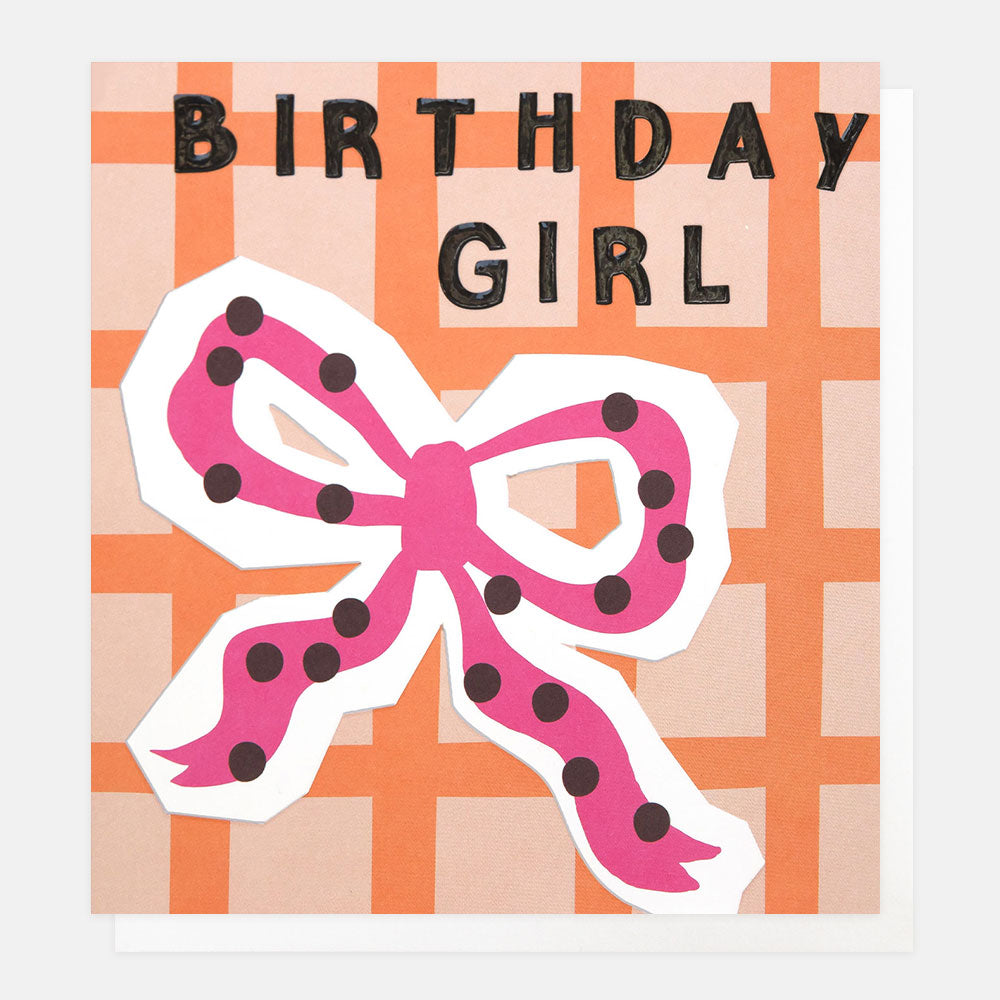 Birthday card with a pink bow and 'Birthday Girl' text on a checkered background