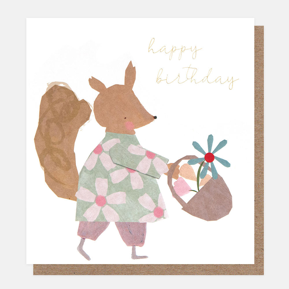 birthday card featuring a squirrel dressed in a flowery top holding a basket of flowers and the words 'happy birthday' in gold script