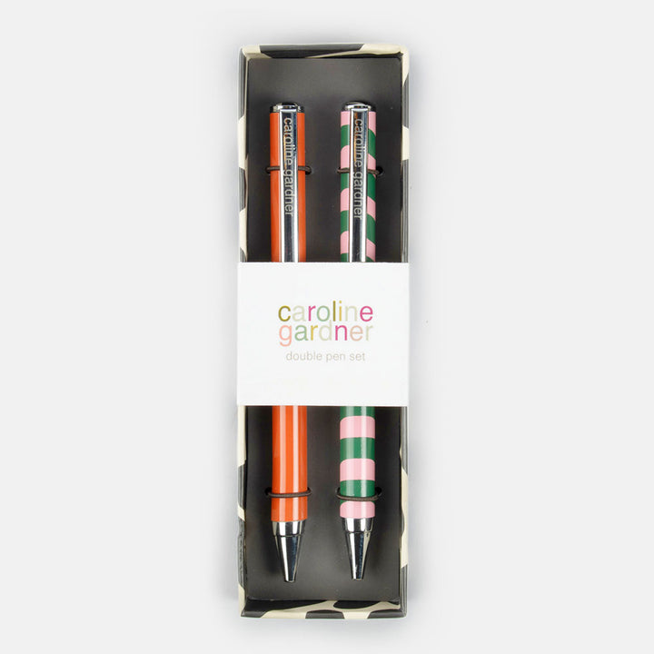 set of 2 ballpoint pens in a gift box. one orange and pink, one pink and green wave stripe design