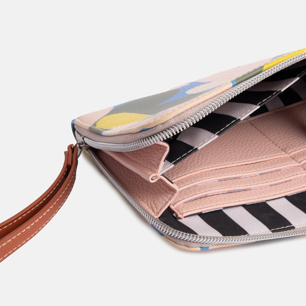 leather look PU travel pouch with internal pockets and wrist strap, with colourful hearts design and monochrome stripe lining