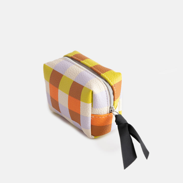 leather look PU ultra mini cosmetic bag in a warm tones check design with a silver zip and black grosgrain pull