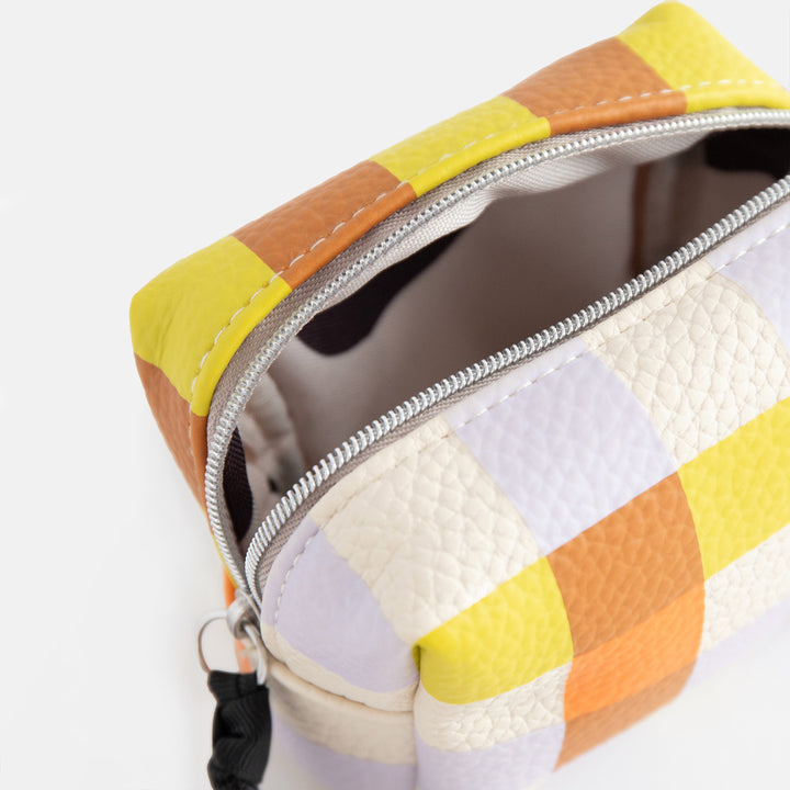 leather look PU ultra mini cosmetic bag in a warm tones check design with a silver zip and black grosgrain pull