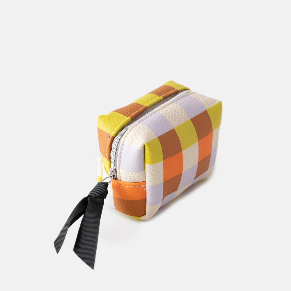 leather look PU ultra mini cosmetic bag in a warm tones check design with a silver zip and black grosgrain pull