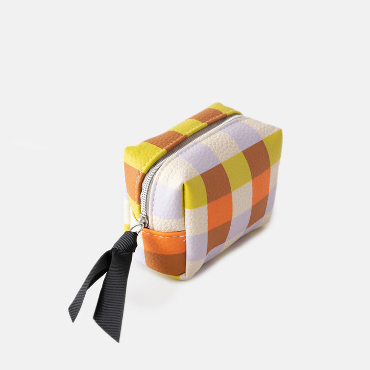 leather look PU ultra mini cosmetic bag in a warm tones check design with a silver zip and black grosgrain pull