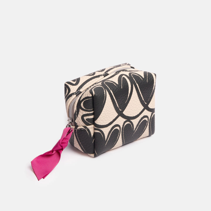 Cosmetic bag with black looped hearts pattern and pink ribbon on a white background
