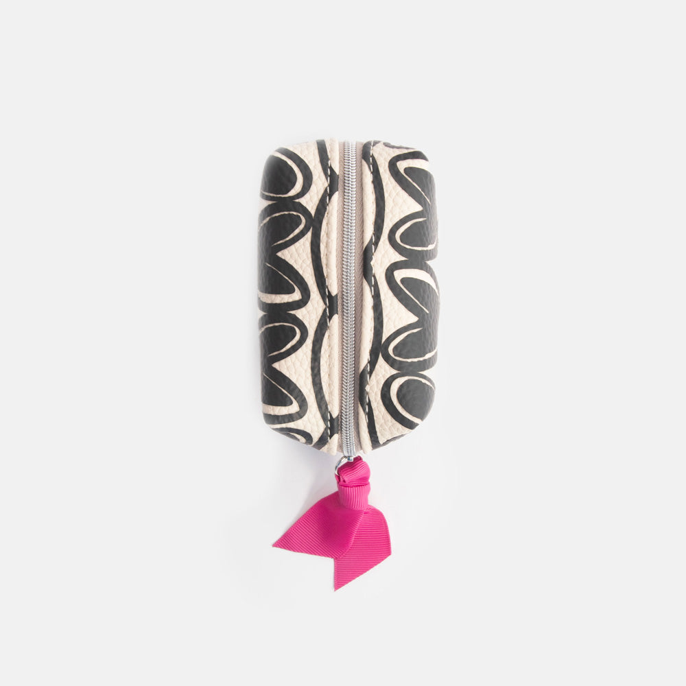 Cosmetic bag with black looped hearts pattern and pink ribbon on a white background