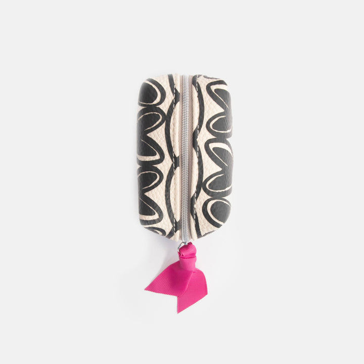 Cosmetic bag with black looped hearts pattern and pink ribbon on a white background