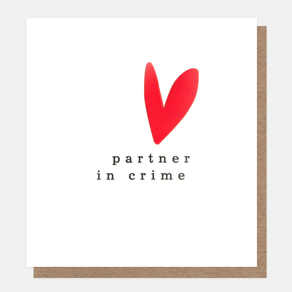 Card with a red heart and text 'partner in crime' on a white background