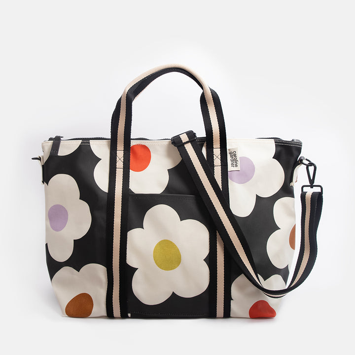Floral-patterned weekend bag on a white background