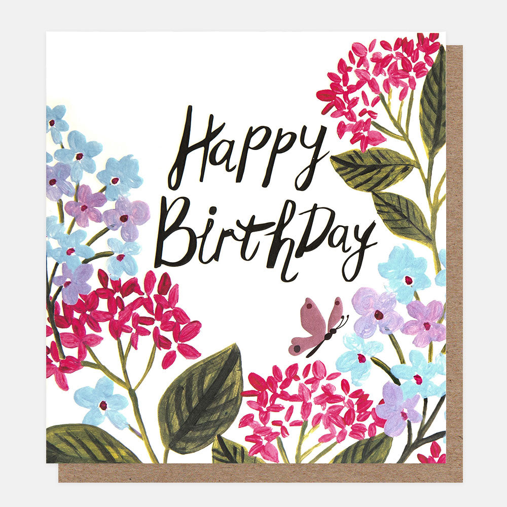 birthday card featuring a butterfly amidst blue and pink flowers and 'happy birthday' message in black handwritten style lettering

